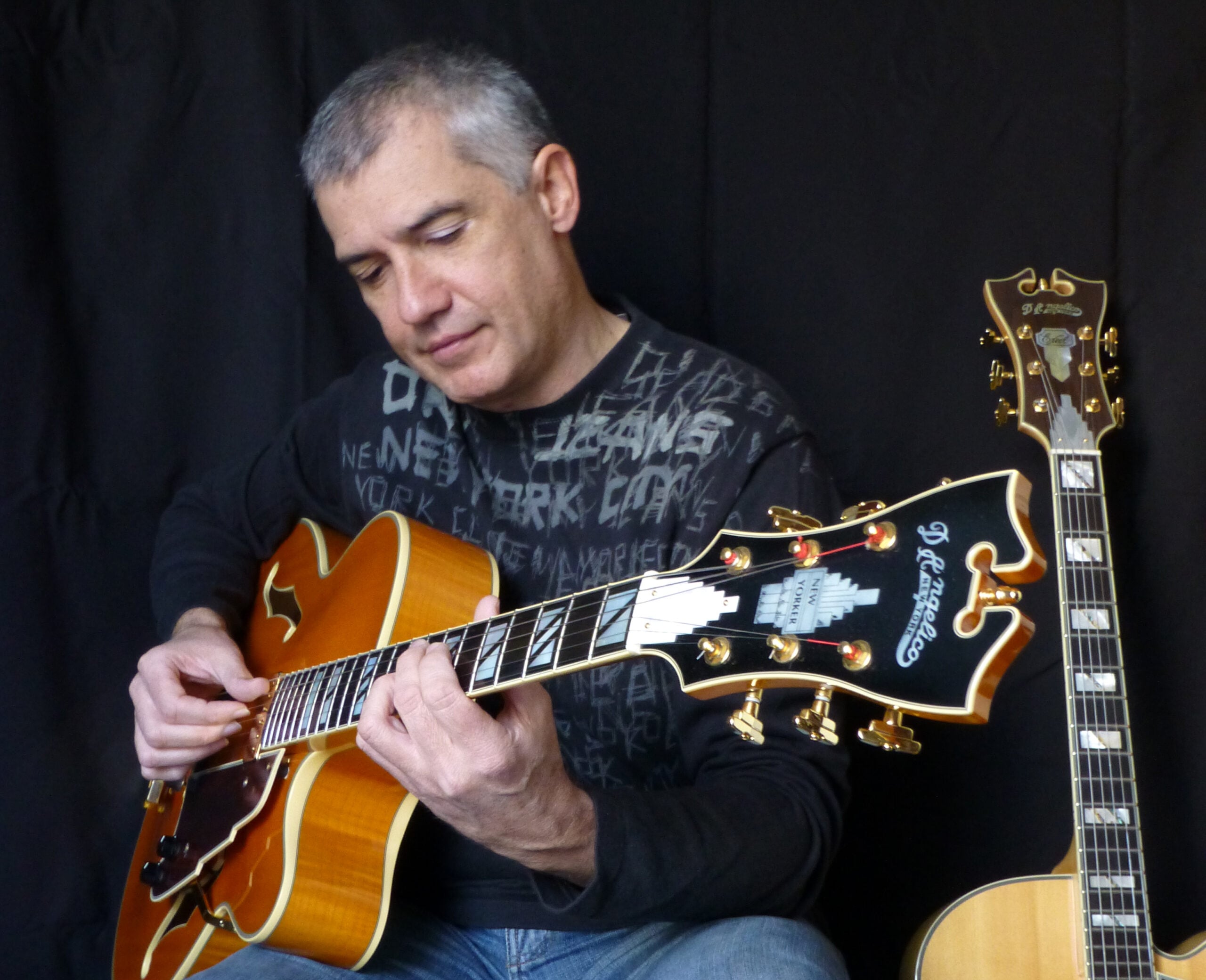 Makis with D'Angelico guitars (1)